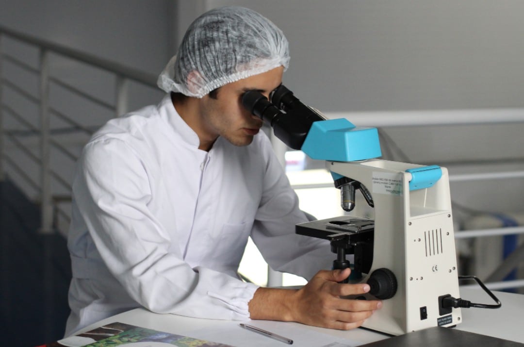 chemist-white-coat-with-microscope